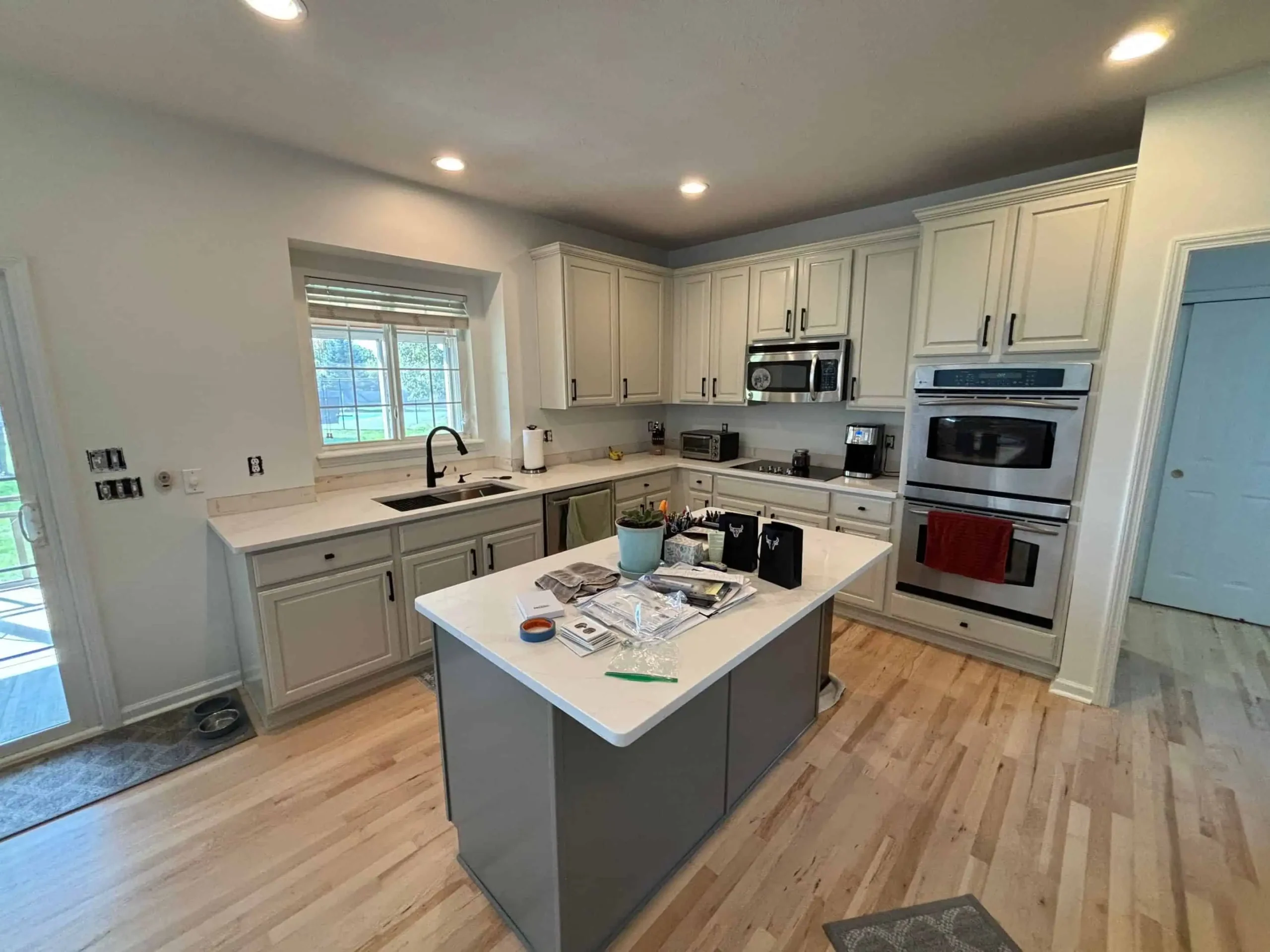 Modern kitchen cabinets painted flawlessly by Indianapolis cabinet painting experts.