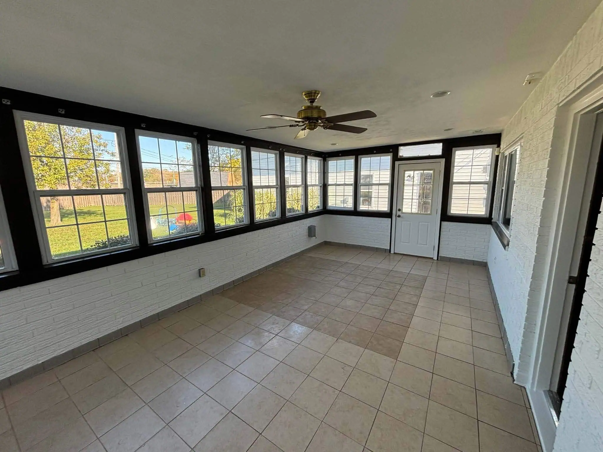 Bright white ceilings painted by professional interior painters, expanding and refreshing the space.