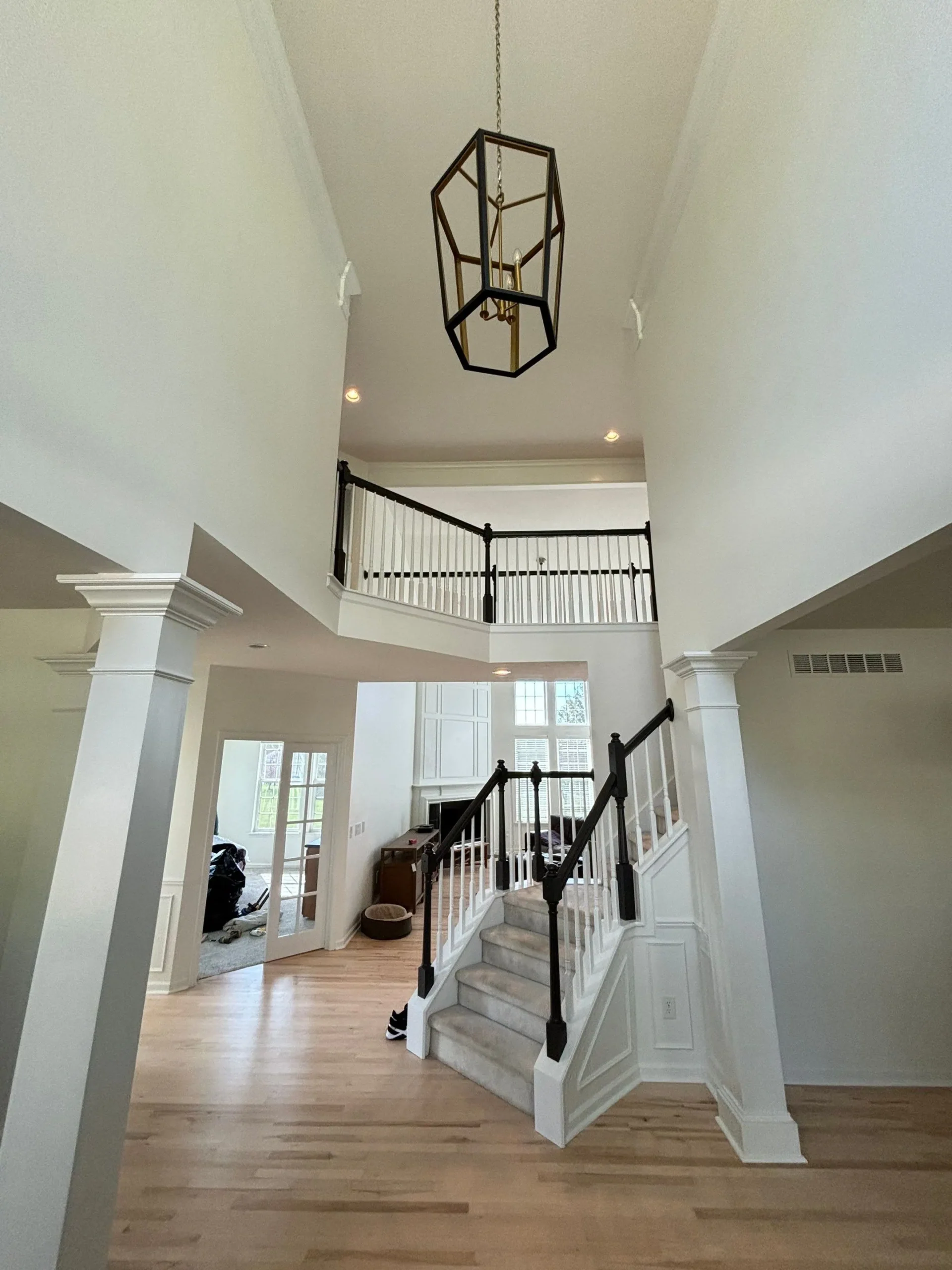 Modern staircase interior with fresh paint by Cowboy Paint Co. in Indianapolis.