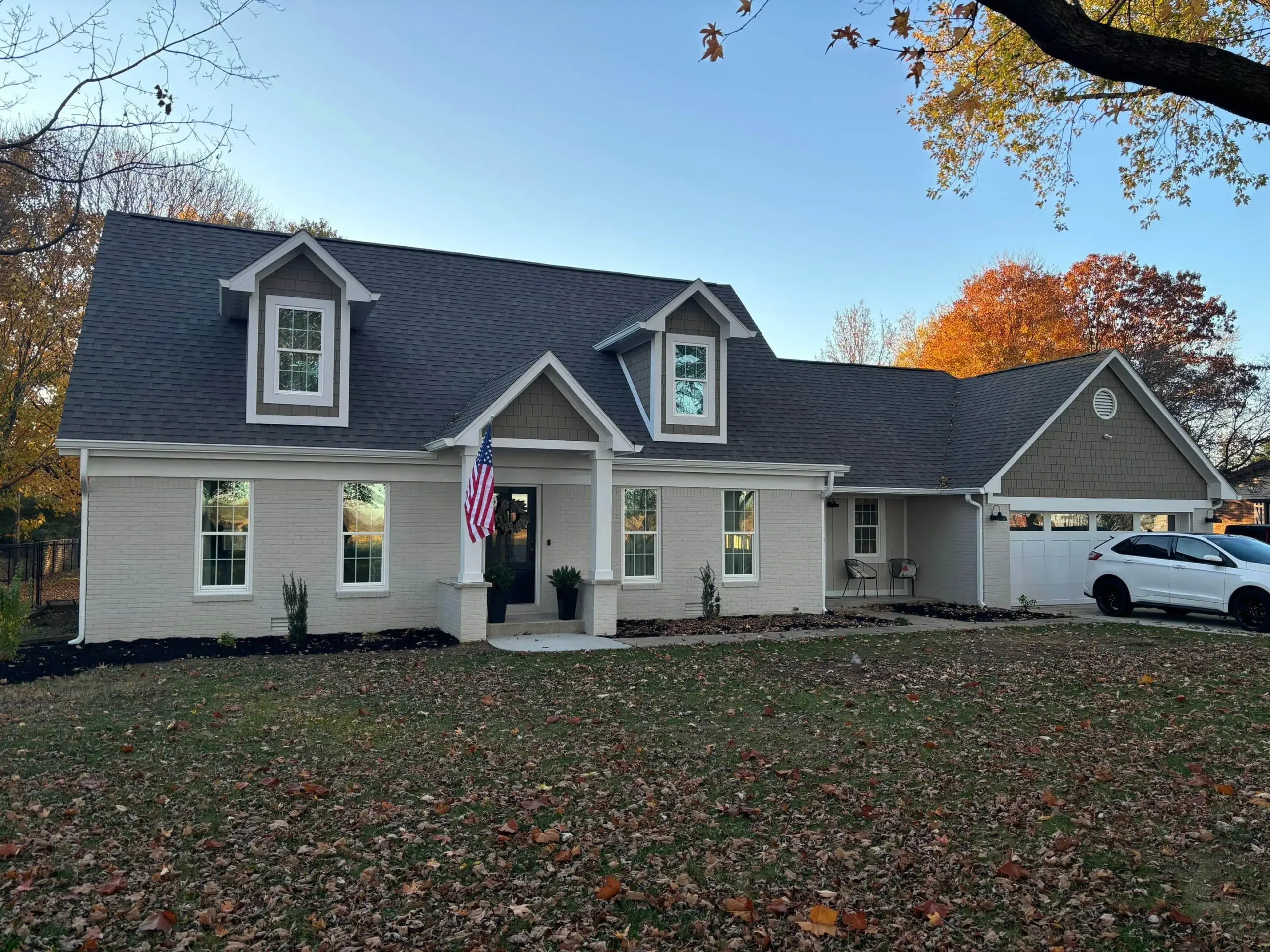 Residential house exterior professionally painted by Cowboy Paint Co. in Indianapolis.