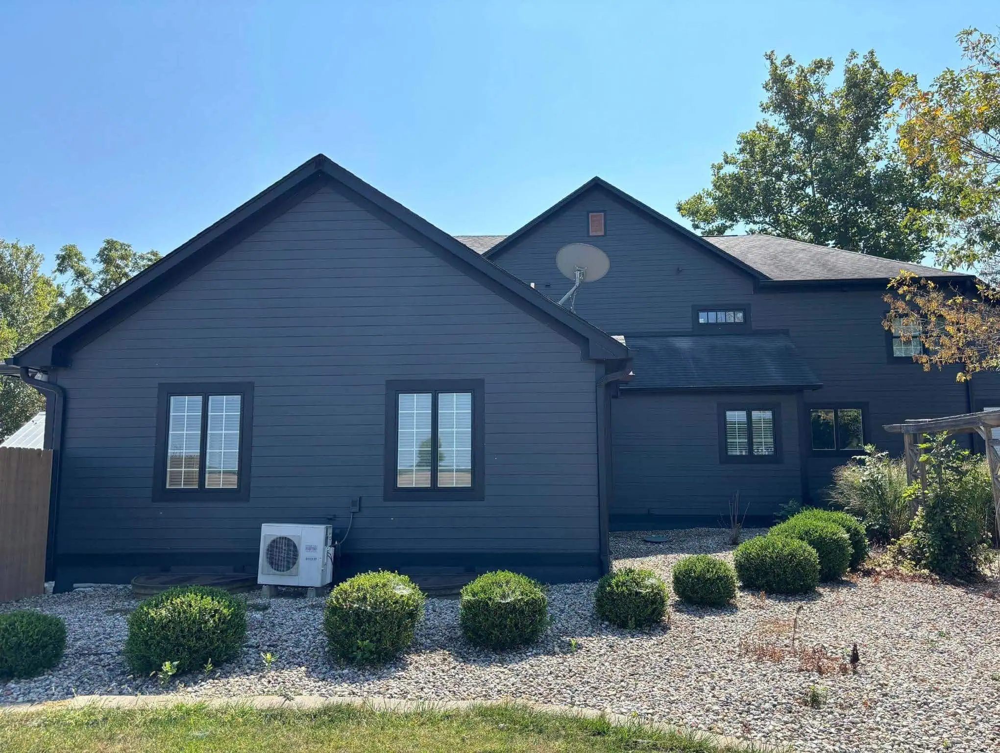 Trim and gutters painted with a clean finish to protect and refresh the home exterior.